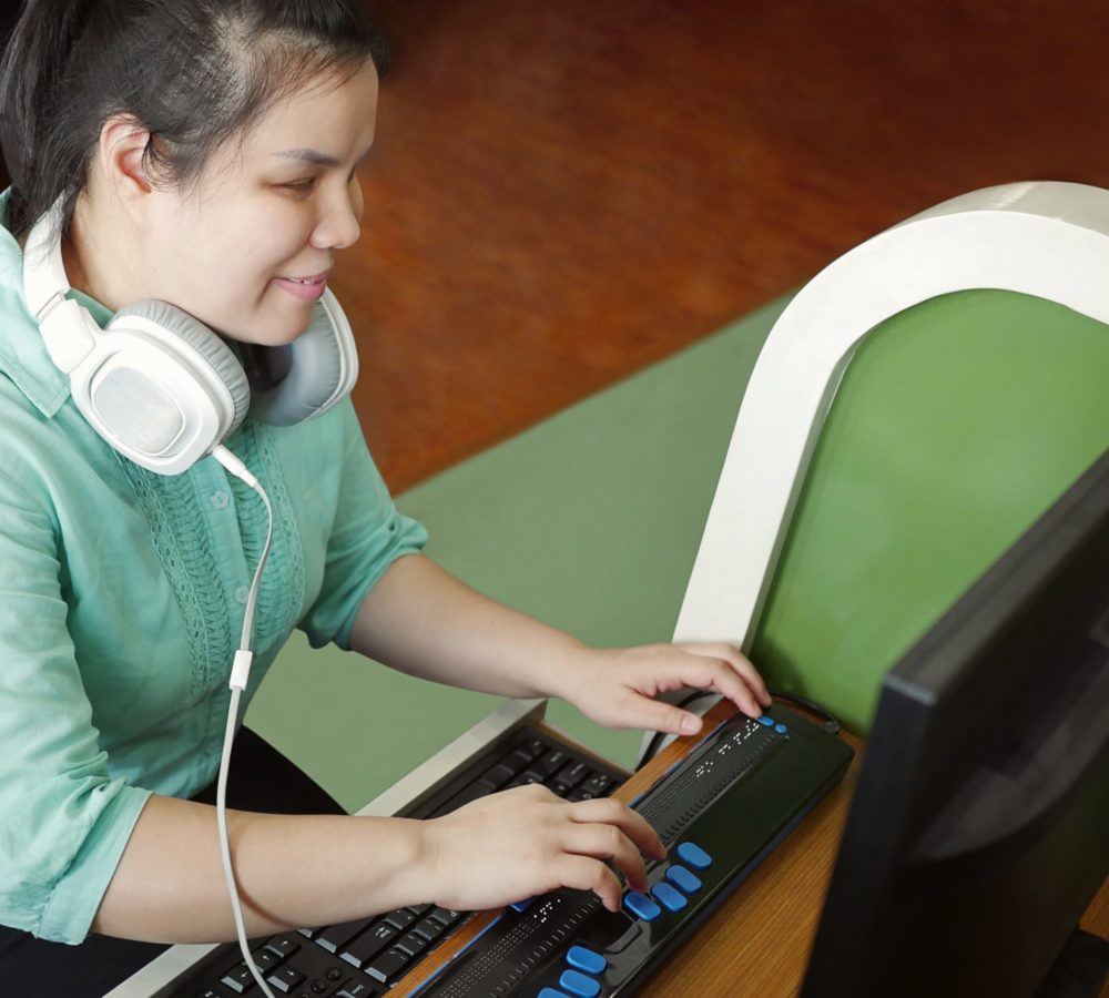person using assistive technology on an ADA website